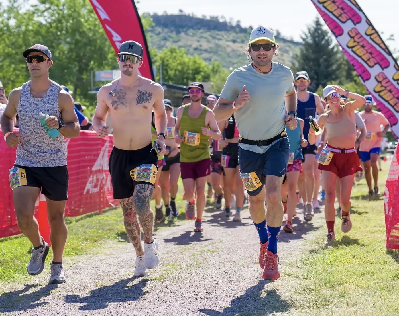 Runners leaving the start of the 5 mile run