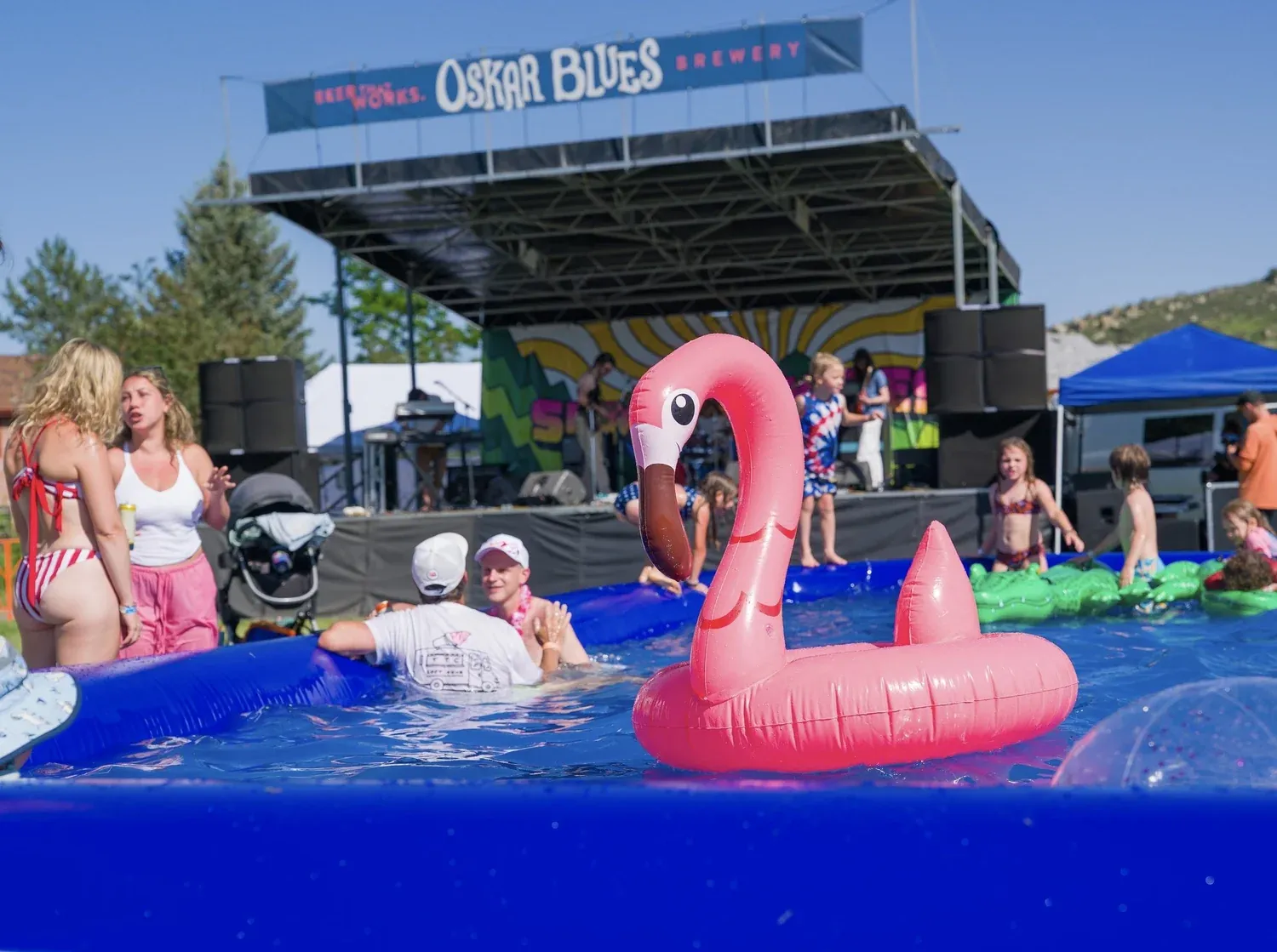 Crowd in the lounge pool in front of the stage